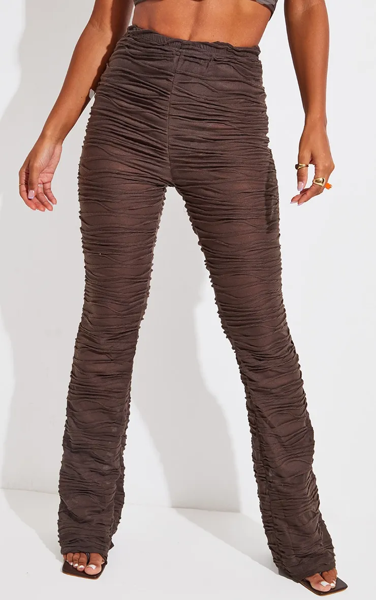 Pantalon skinny en jersey marron à jambes évasées et plis