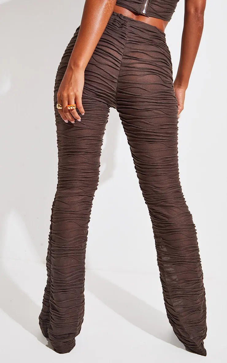 Pantalon skinny en jersey marron à jambes évasées et plis